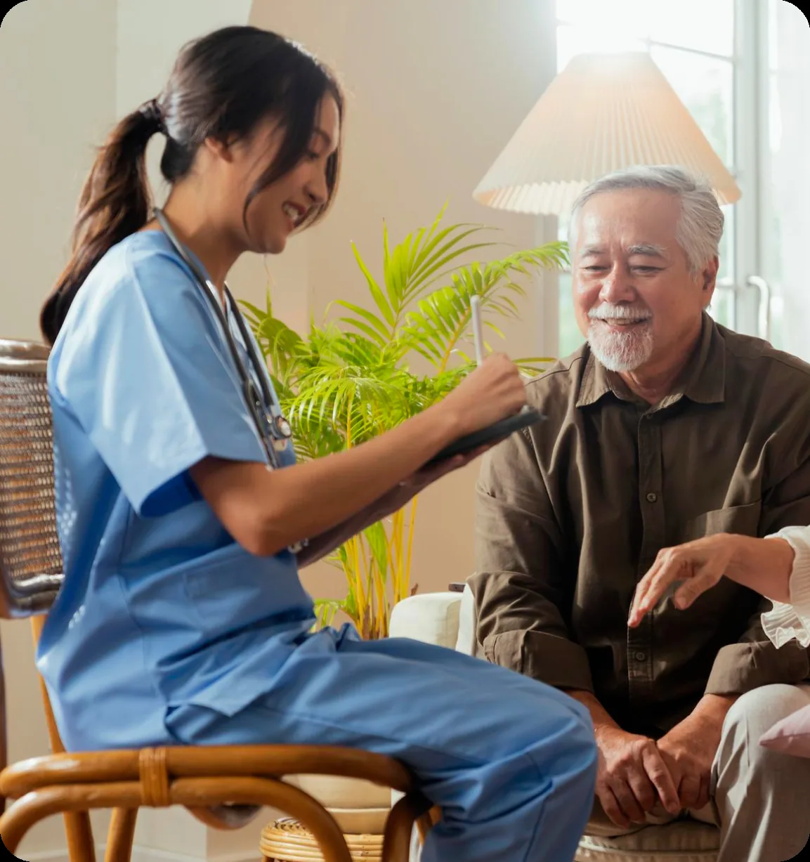 Nurse caring for an elderly patient